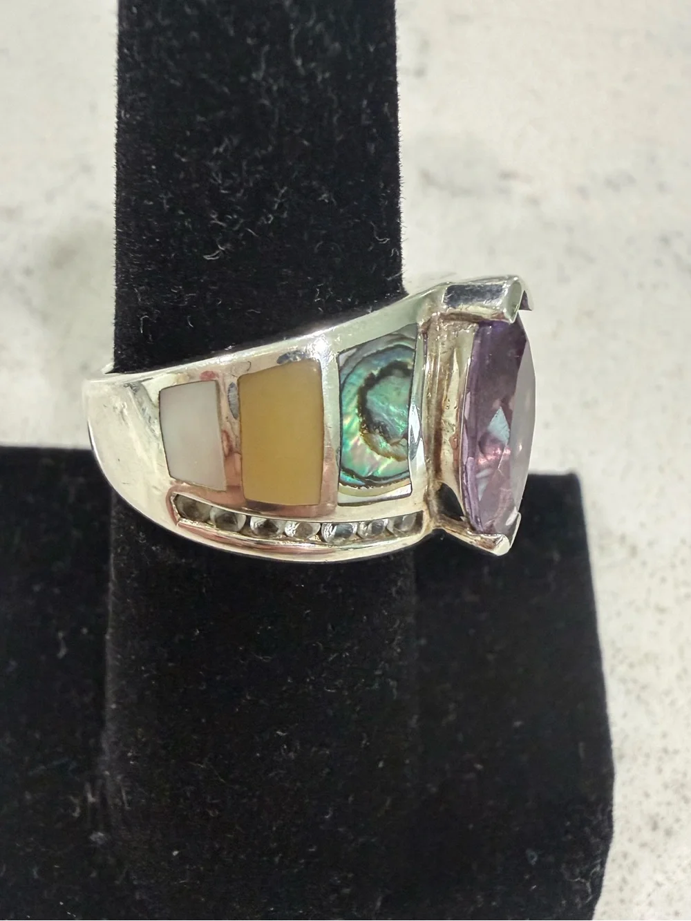 Sterling Silver Ring with Marquise Amethyst and white topaz gemstones on sides